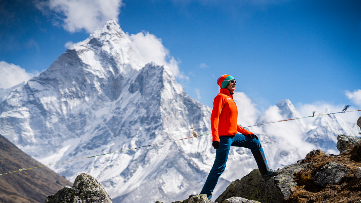 Personal trainer coaches an iFIT walking workout