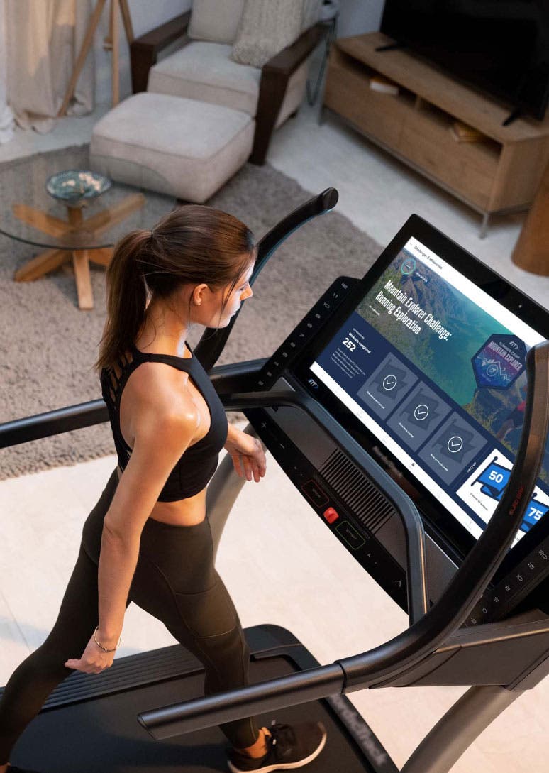 Woman walking on NordicTrack treadmill