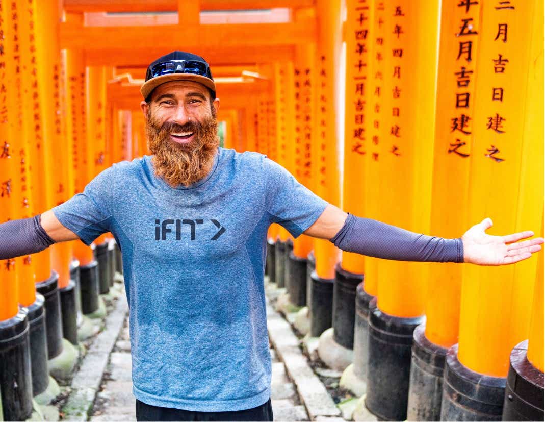 Personal trainer coaches an iFIT running class