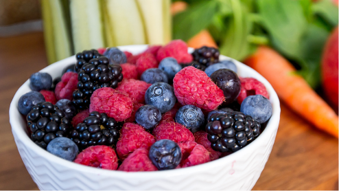 Bowl of blueberries, blackberries and fruit