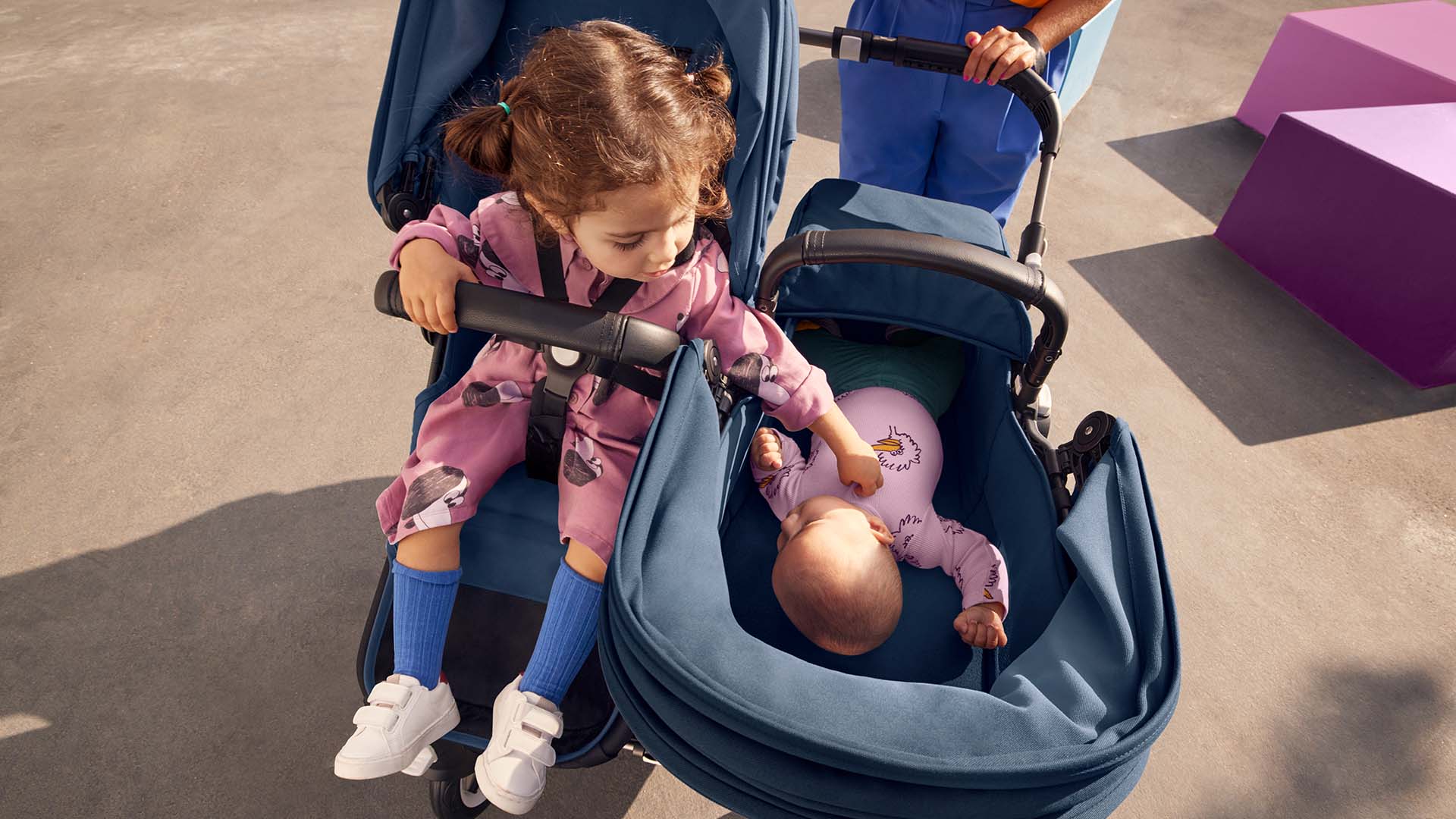 Bugaboo pram with two babies