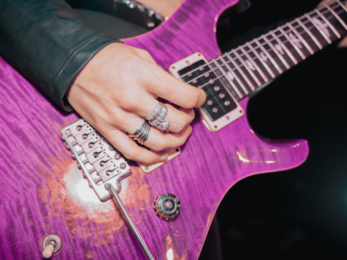 Guy Playing Guitar at Riffs Bar