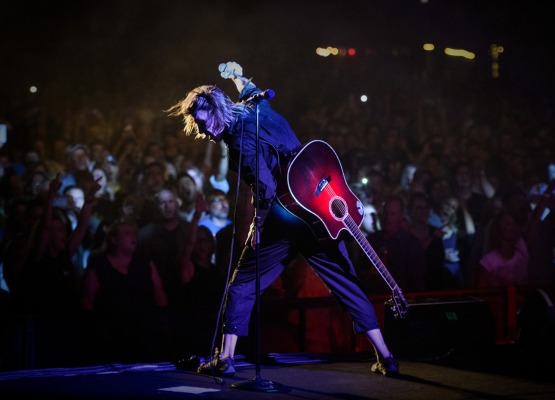 Man singing on stage