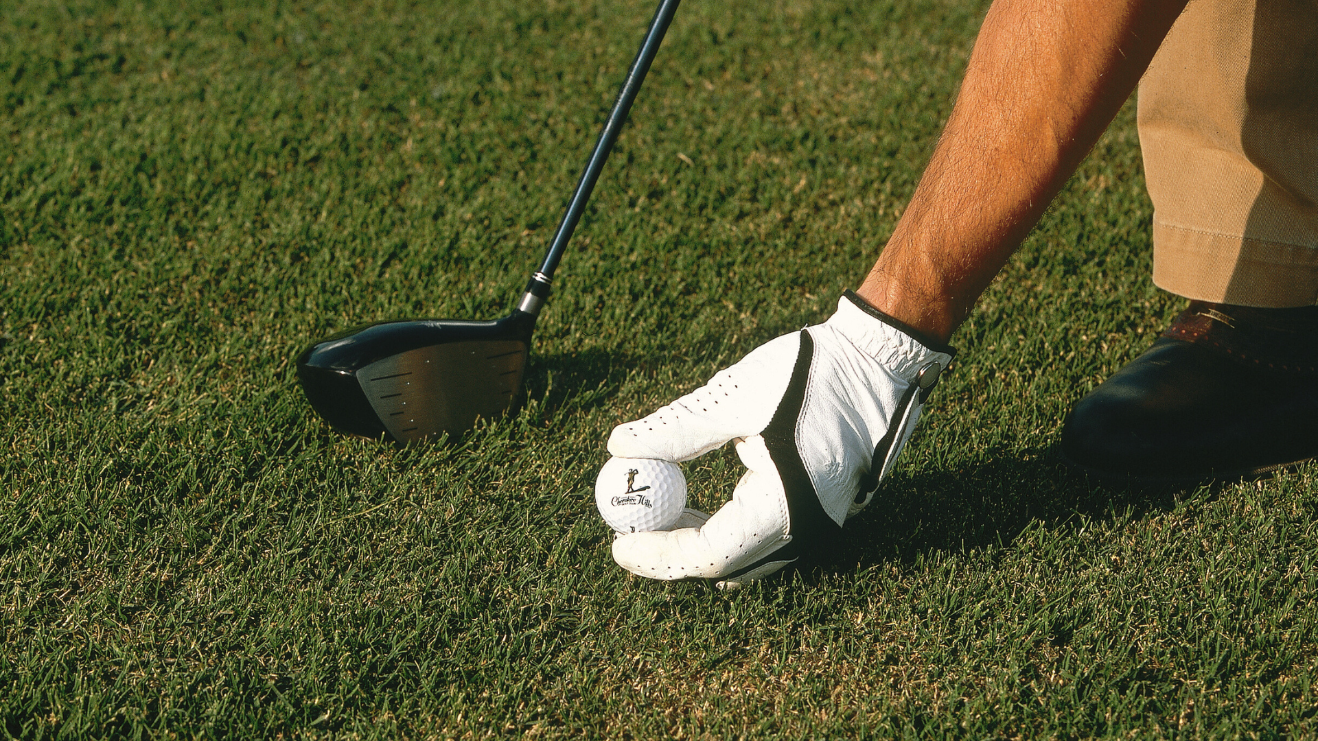 Person holding Cherokee Hills Golf Ball