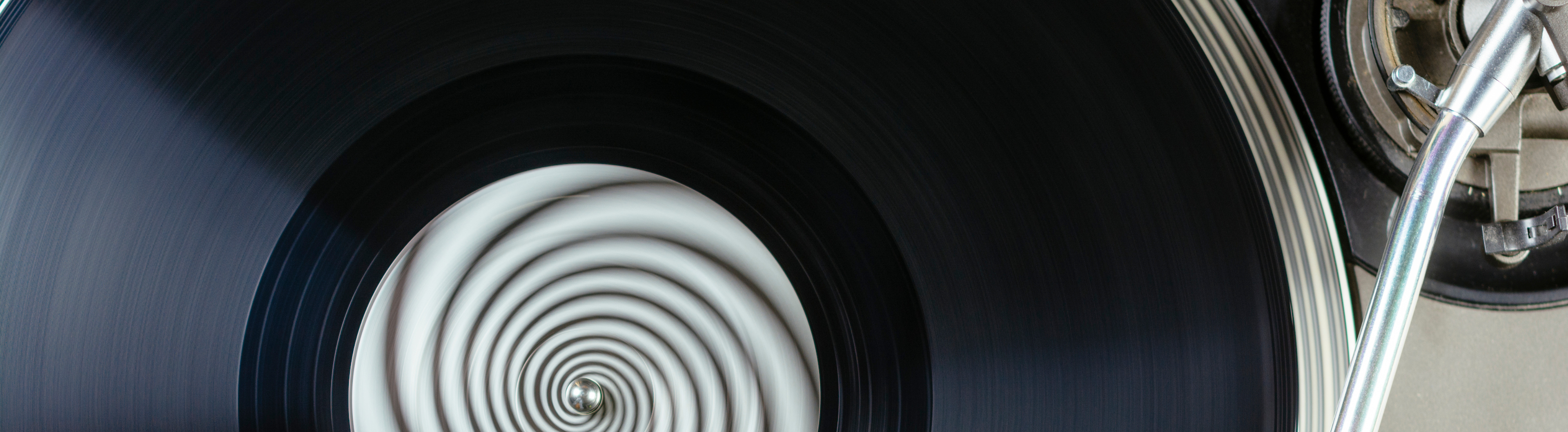 Black & White Spiral Vinyl Playing on Record Player