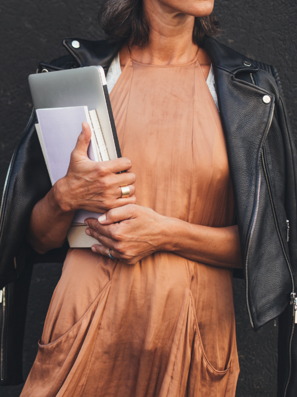 Woman holding laptop