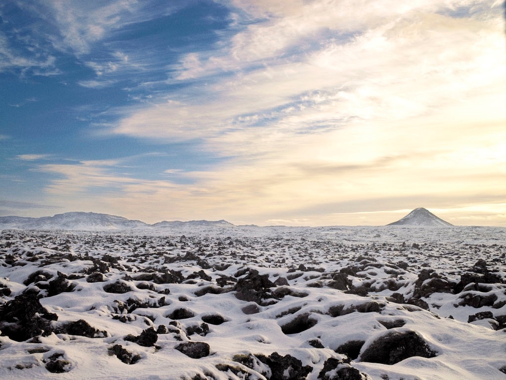 A view of a snowy Icelandic landscape on a bright winter's day