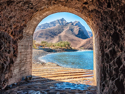 A picture looking through the access tunnel to La Aldea Beach