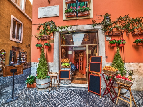A scene of the outside of a beautiful little food shop / cafe in Rome, Italy 