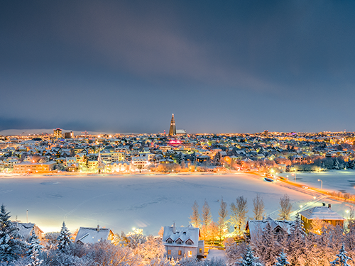 The city of Reykjavík in the winter, with Tjörnin lake and Hallgrímskirkja church in view 