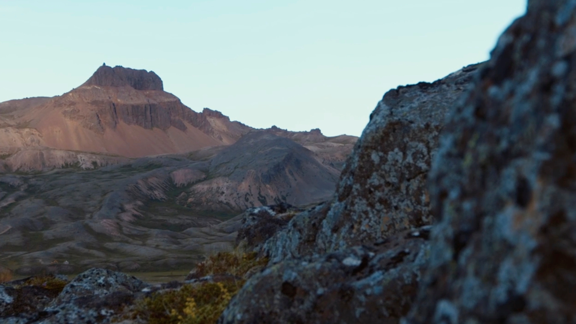 The picturesque rhyolite and basalt mountains that serve as a backdrop for Braedslan music festival