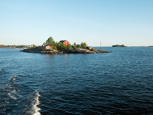 Suomenlinna island in Helsinki, as pictured from the back of a boat 