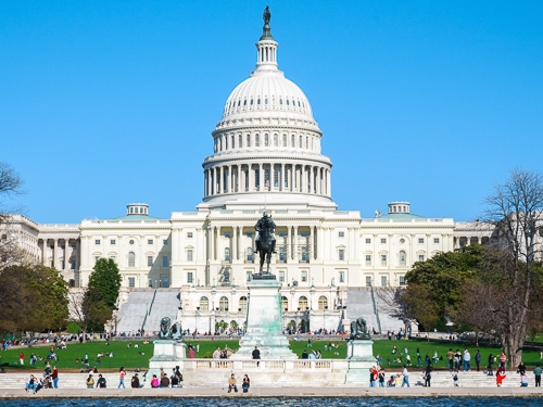The United States Capitol building in Washington DC pictured on a bright sunny day 