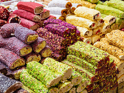 Colorful stacks of lokum, also known as Turkish Delight, at the Grand bazaar in Istanbul