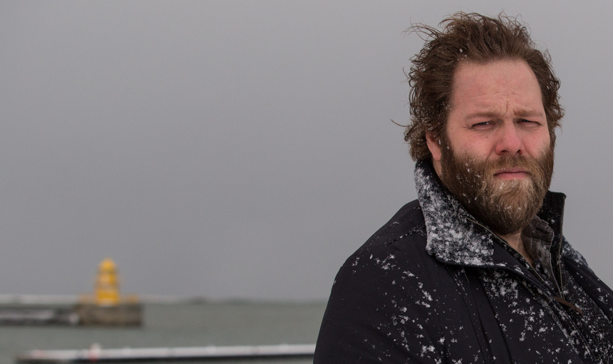 Outdoor image of Ólafur Darri Ólafsson in snow-covered jacket