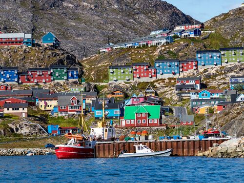 the colourful houses of Qaqortoq line the bay