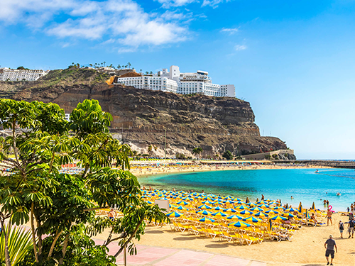 A view of the Playa de Amadores beach during peak season in Gran Canaria 