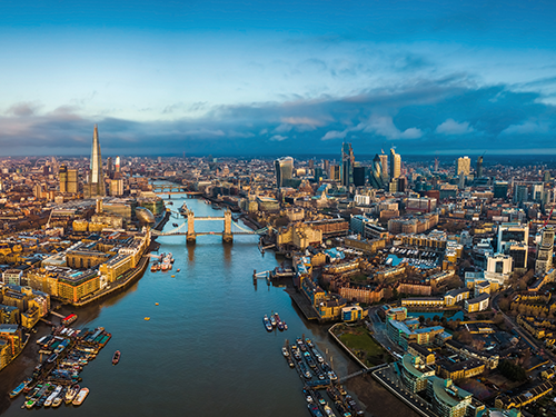 An overhead view of the city of London in evening light