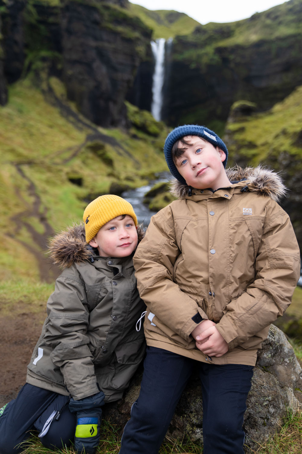 Chris Burkard's sons, Forrest and Jeremiah, at Kvernufoss waterfall