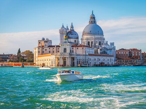 The Grand canal in Venice with the Basilica Santa Maria in the background