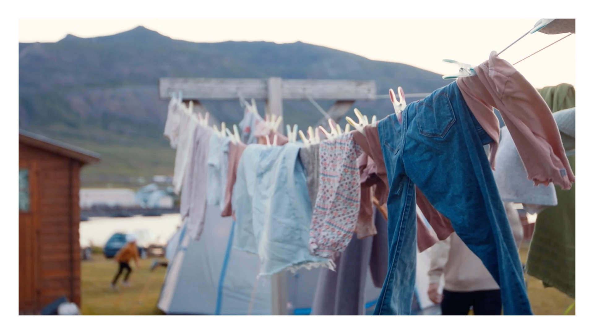 A local family dries their washing on the washing line, with the mountains of Borgarfjordur Eystri in the background