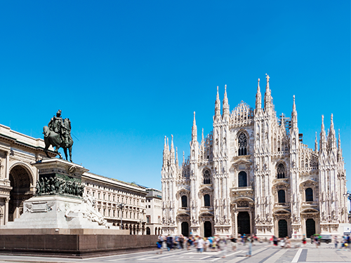 The Duomo di Milano here pictured from across the square on a bright sunny day 