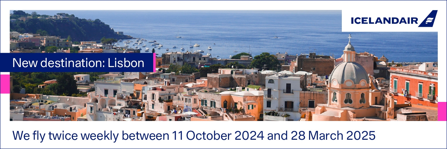 Banner displaying an image of Lisbon with text that reads 'New destination: Lisbon. We fly twice a week from October 11th 2024 to March 28th 2025.'