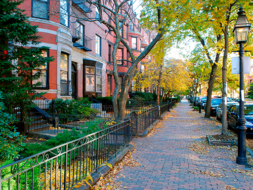 A historic residential street in Boston pictured in the autumn season