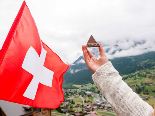 Swiss chocolate with alps behind