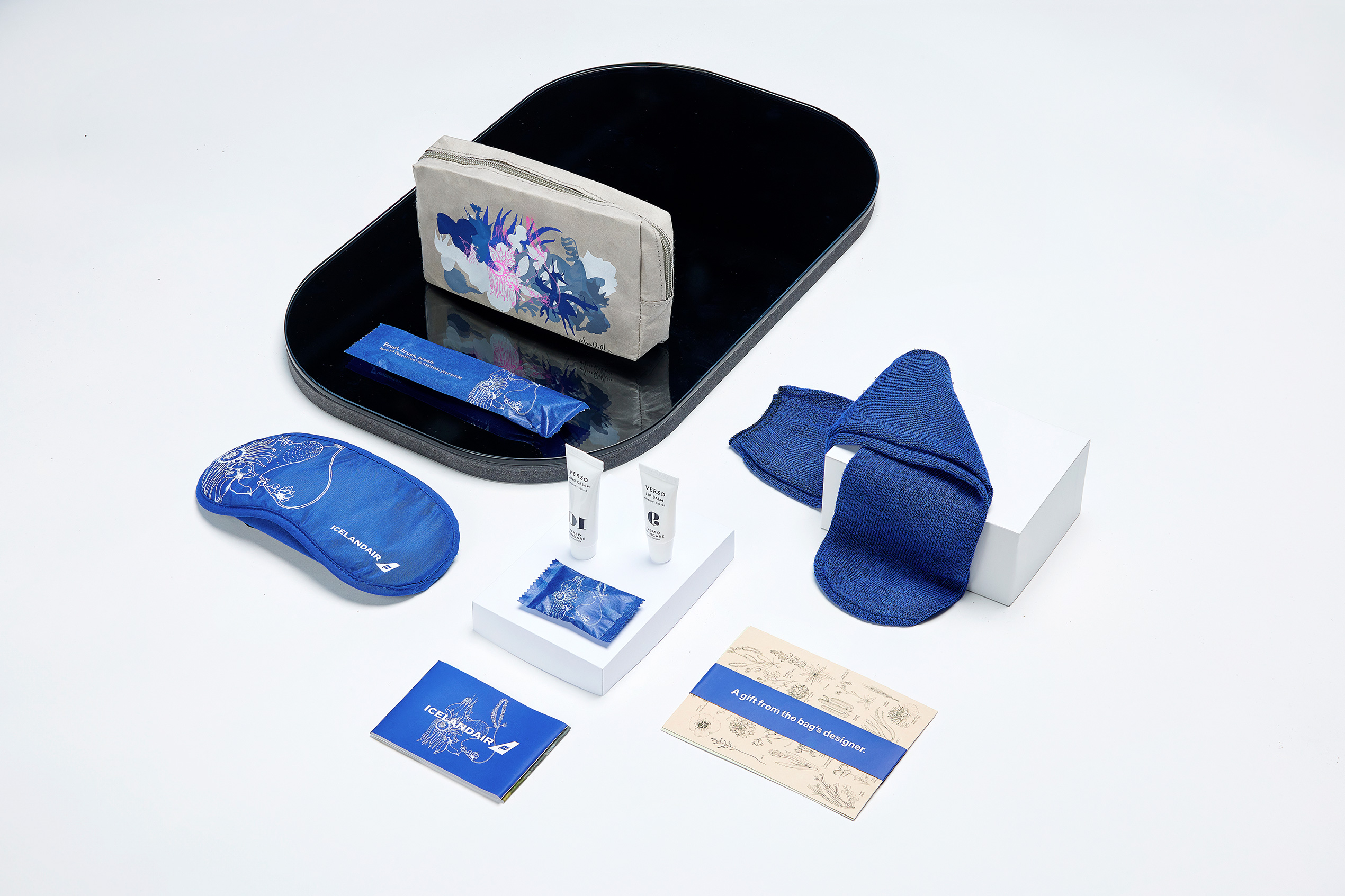 Icelandair's Flora amenity kit and contents, including kit bag, socks, eye mask, and skincare items