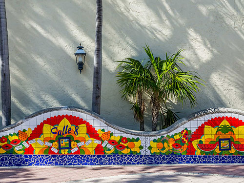 a bright Latin mosaic with palm trees