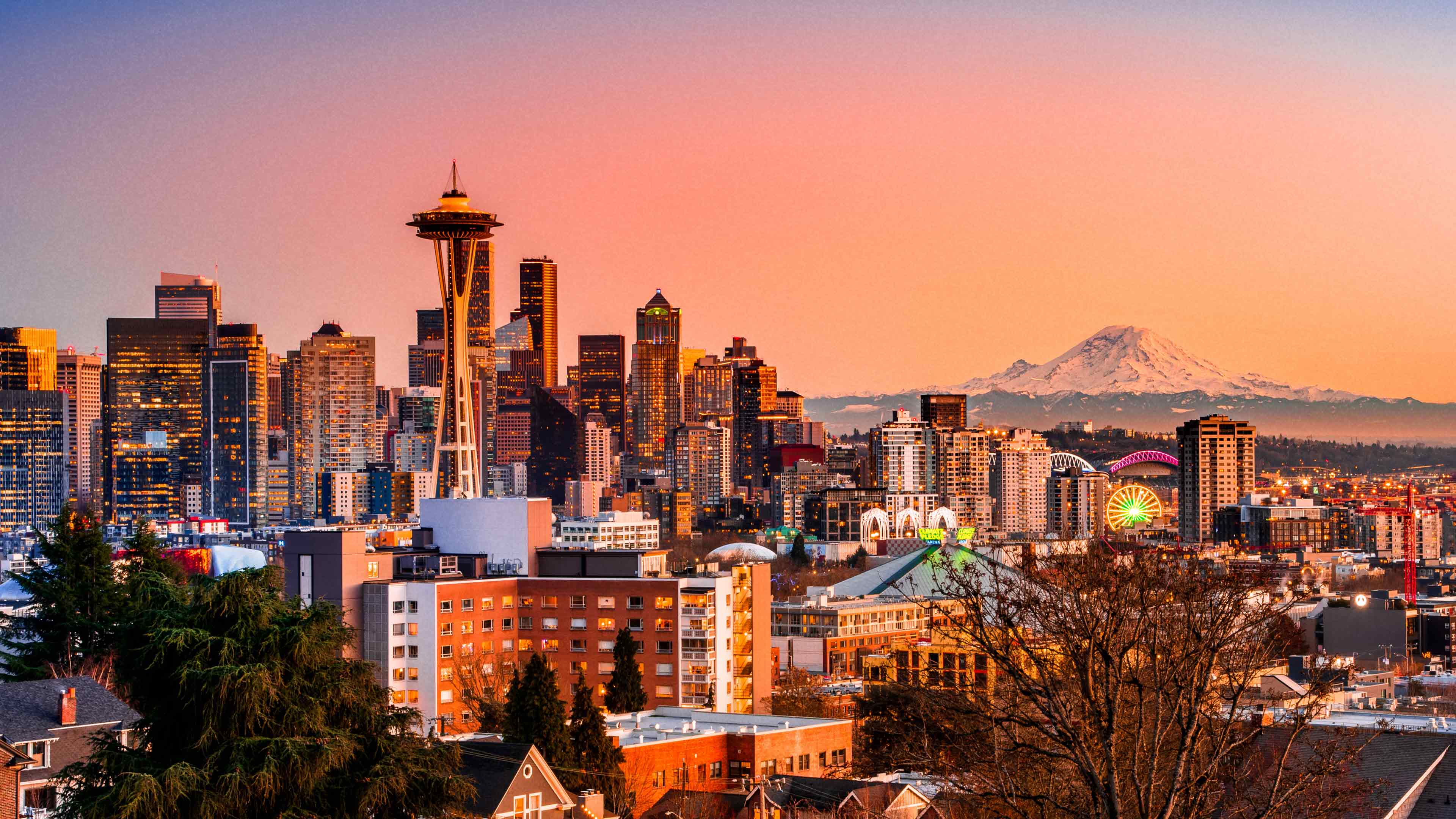 The Seattle skyline with the Space Needle and Mount Rainier in the background