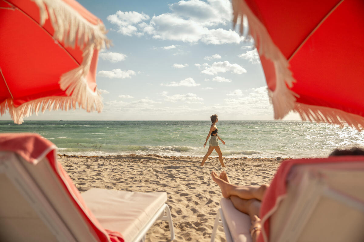 Woman walking on beach