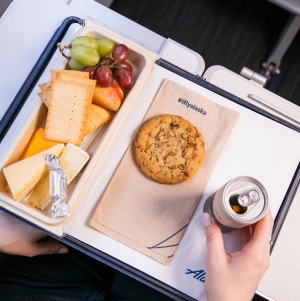 Fuente de frutas y quesos durante el vuelo