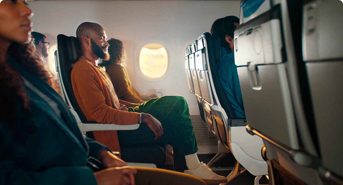 Guy sitting in Premium Class
