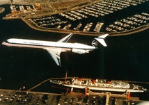 A 1972 photo of an Alaska Airlines aircraft flying.
