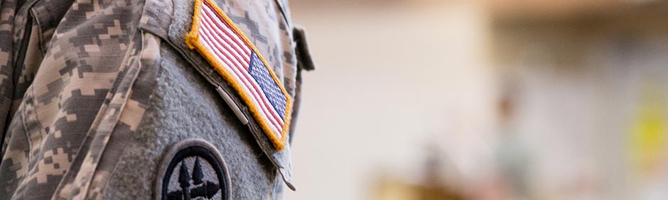 Military uniform with the american flag patch