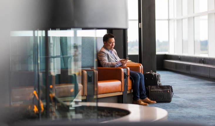 Person waiting in a lounge.