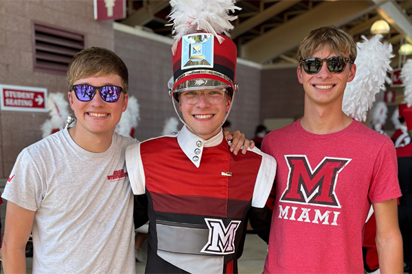 Casey, Aidan, and Nick Hargett, triplet brothers.