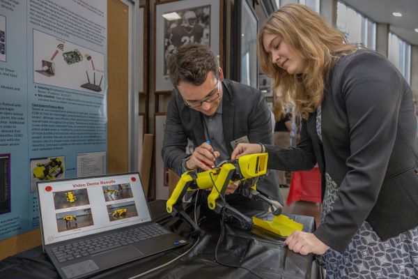 Senior Design students displaying their project
