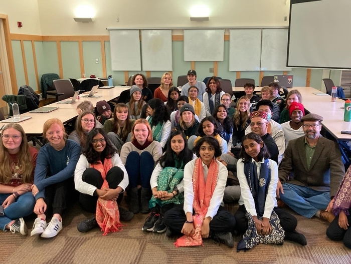 Decorative: Anthropology students and professor sit together for a group photo.