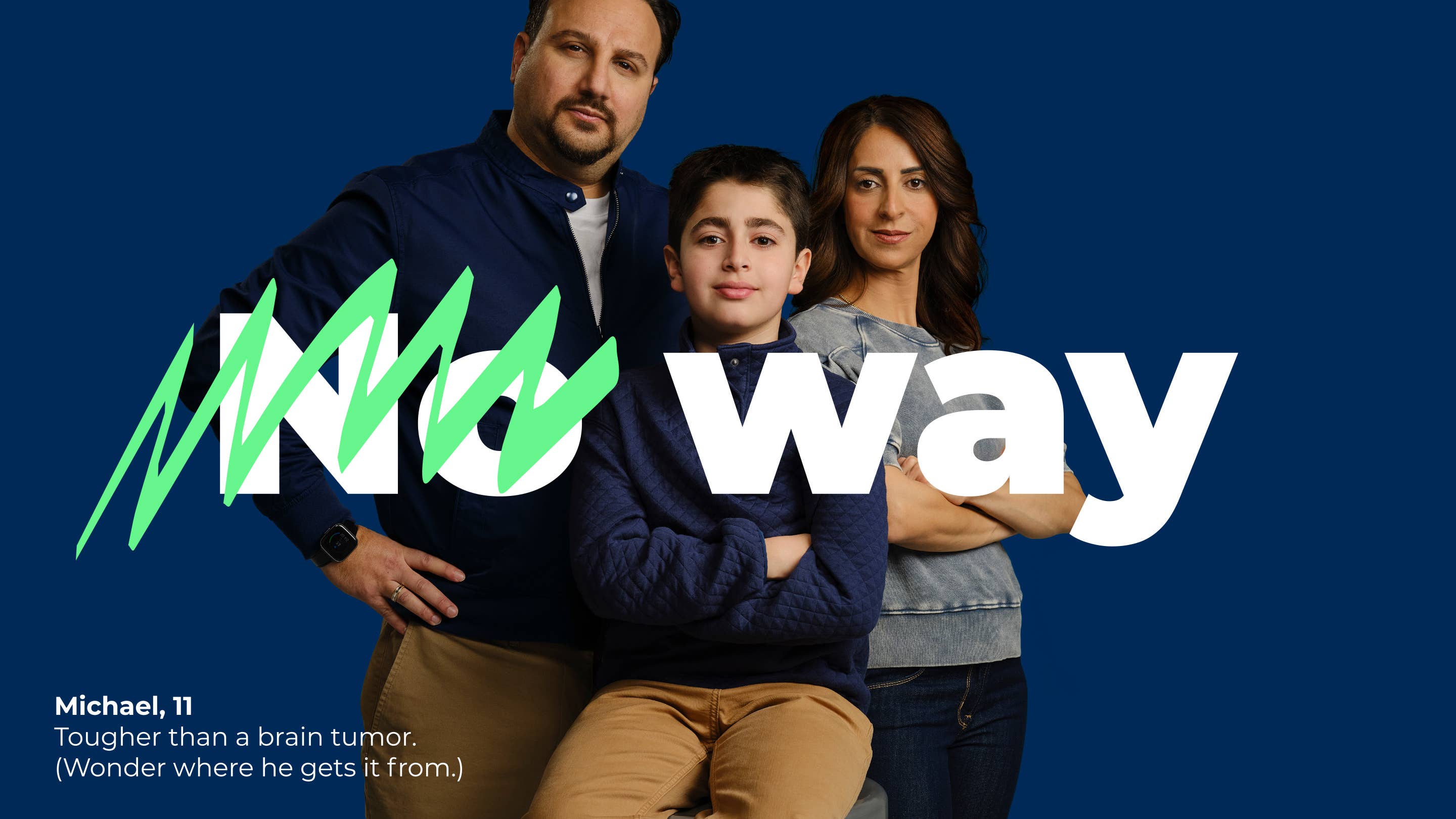 Mother and father standing behind a preteen son