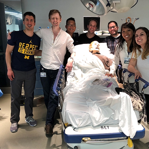 A patient in a hospital bed, demonstrating the environment of medical care and the importance of simulation training in healthcare.