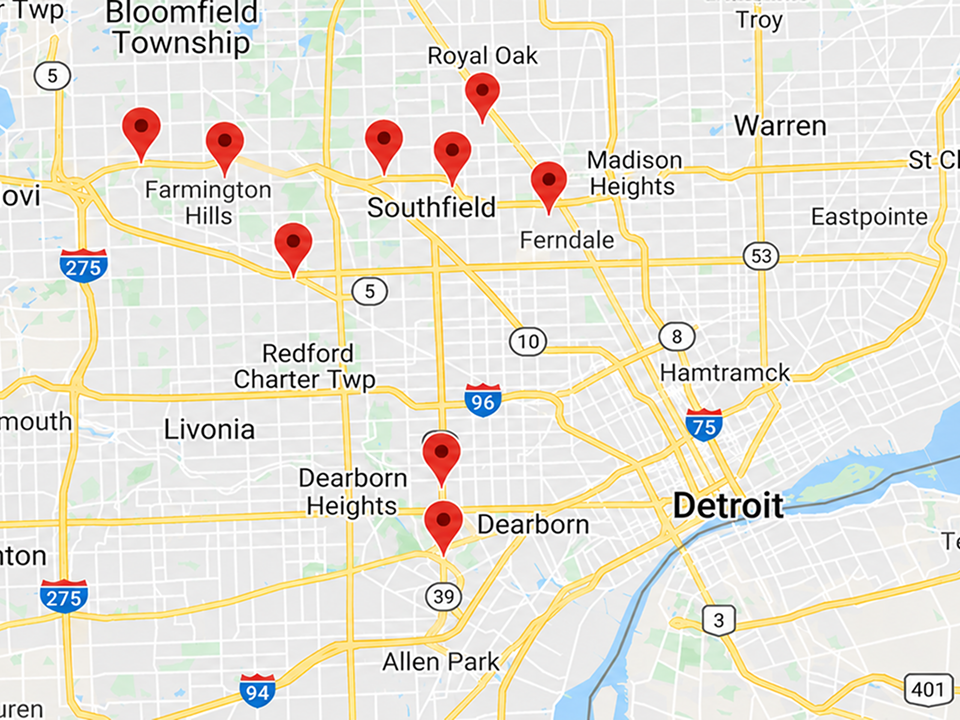 Map of metro Detroit showing multiple psychiatry residency training locations marked with red pins.