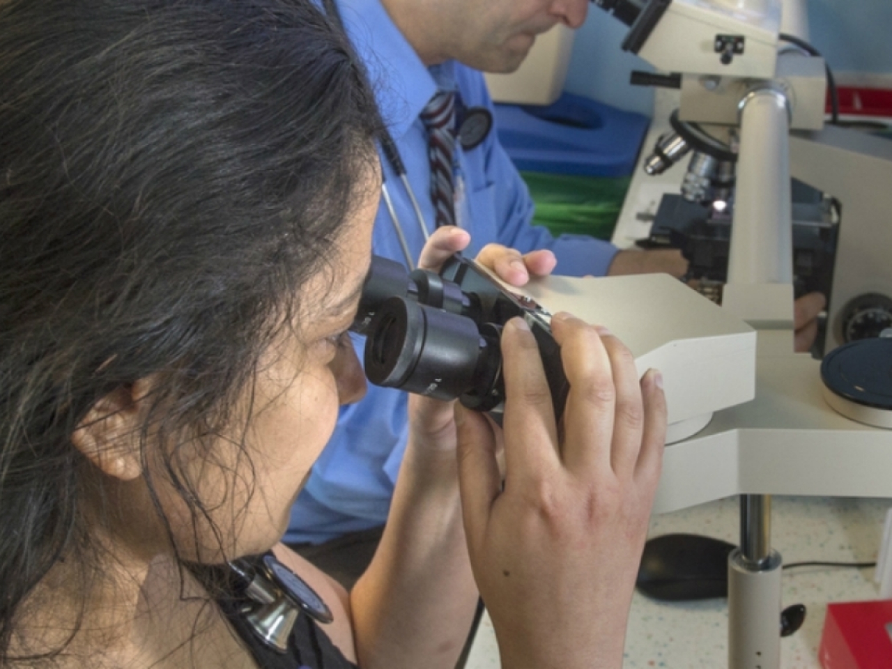 Viewing lab results through a microscope