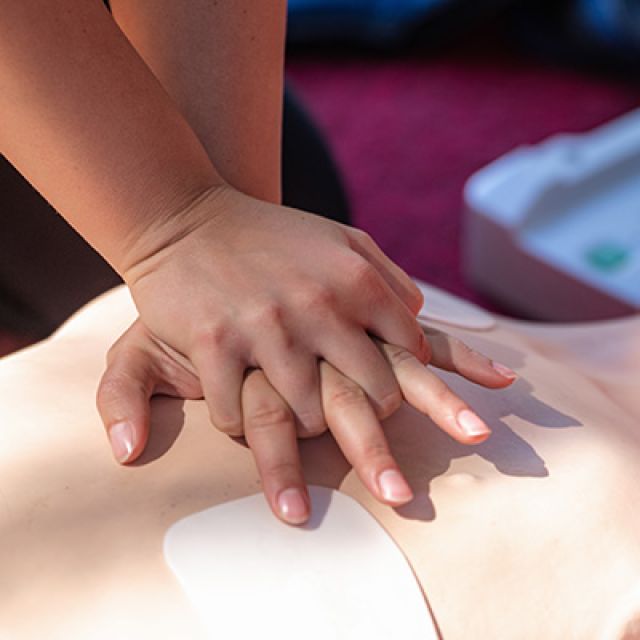 CPR and first aidperson performing CPR on a patient