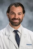 Justin Trivax, MD