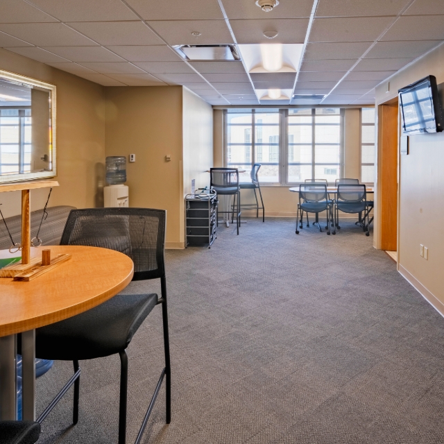 resident lounge at St. Joseph with tables and chairs