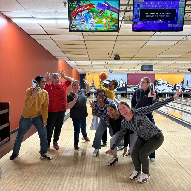 Group of fellows bowling together
