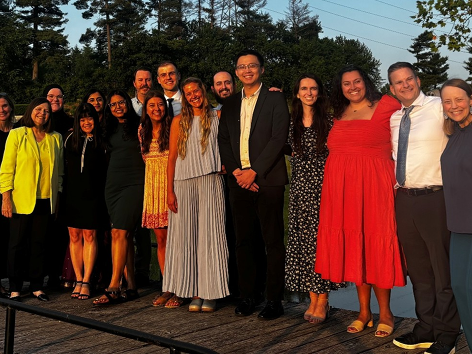 Group photo of Internal Medicine and Pediatrics residents during a waterfront resident life event.